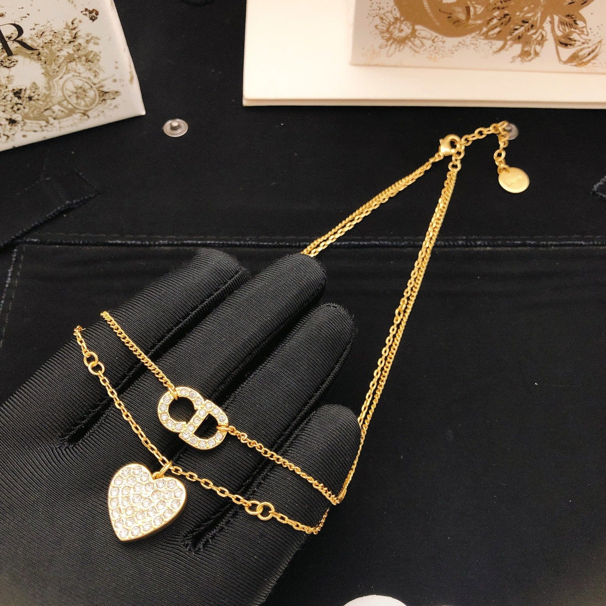 Martin Graham pendant necklace in polished metal-tone – side detail