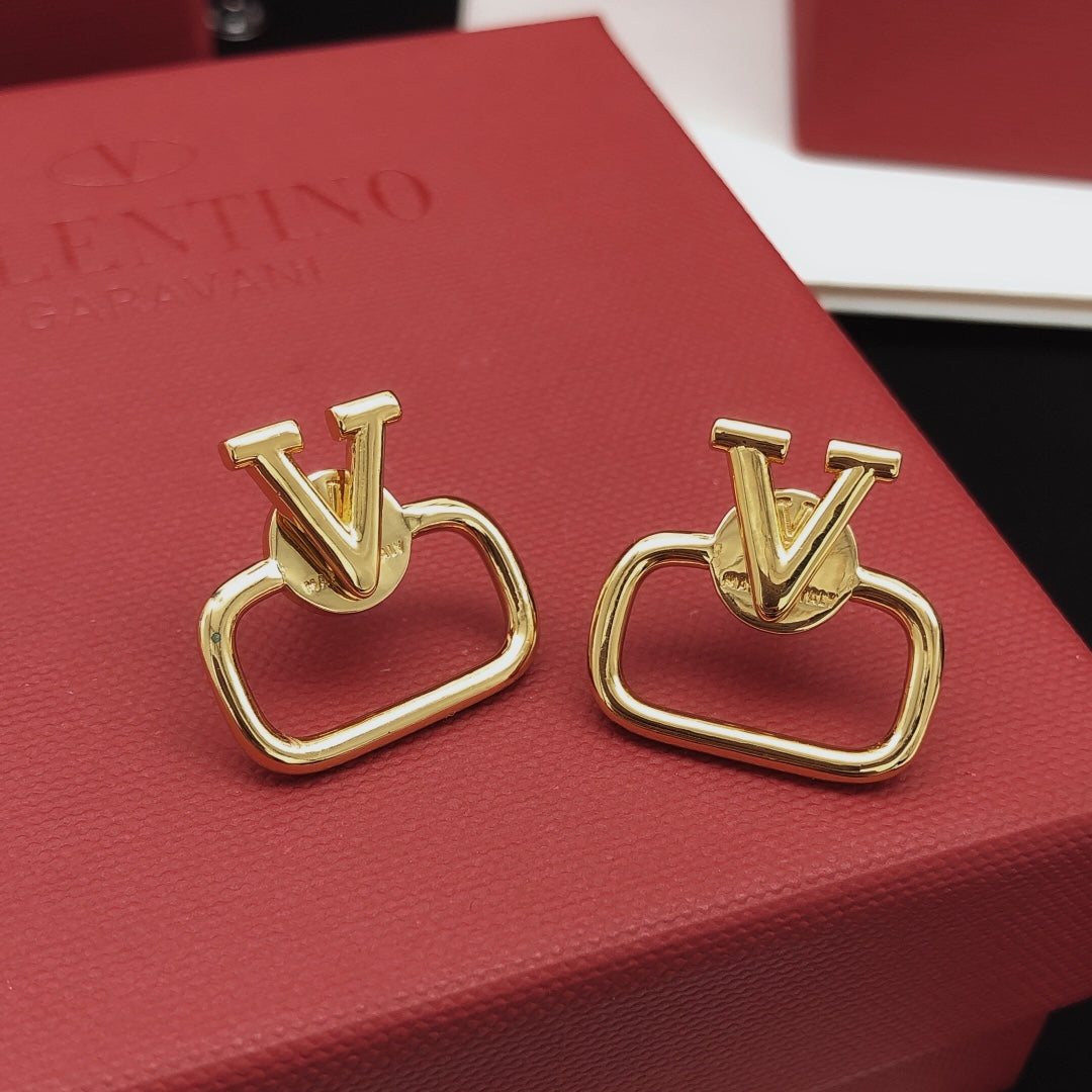Martin Graham stud earrings in polished metal-tone – side detail