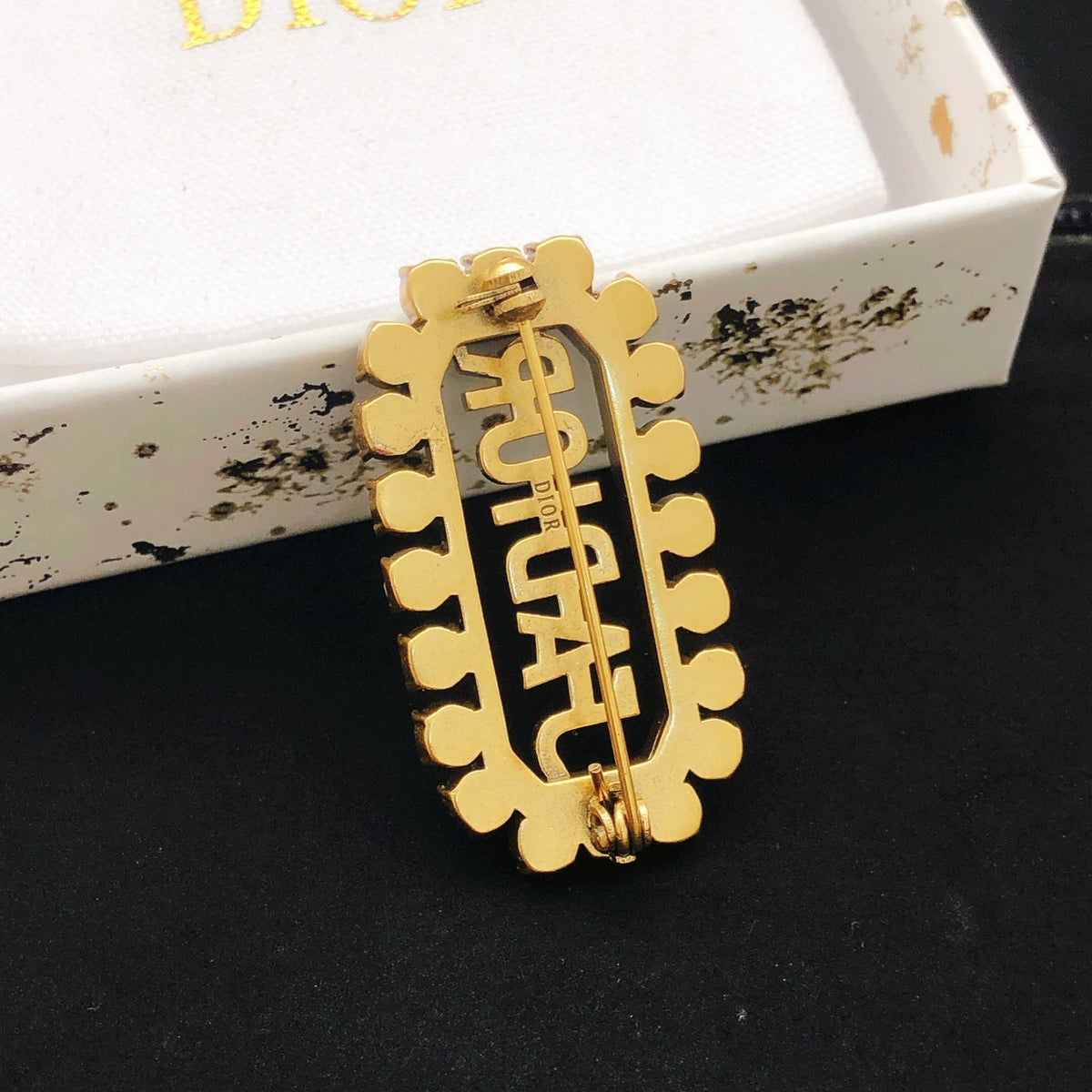 Martin Graham brooch in polished metal-tone – side detail