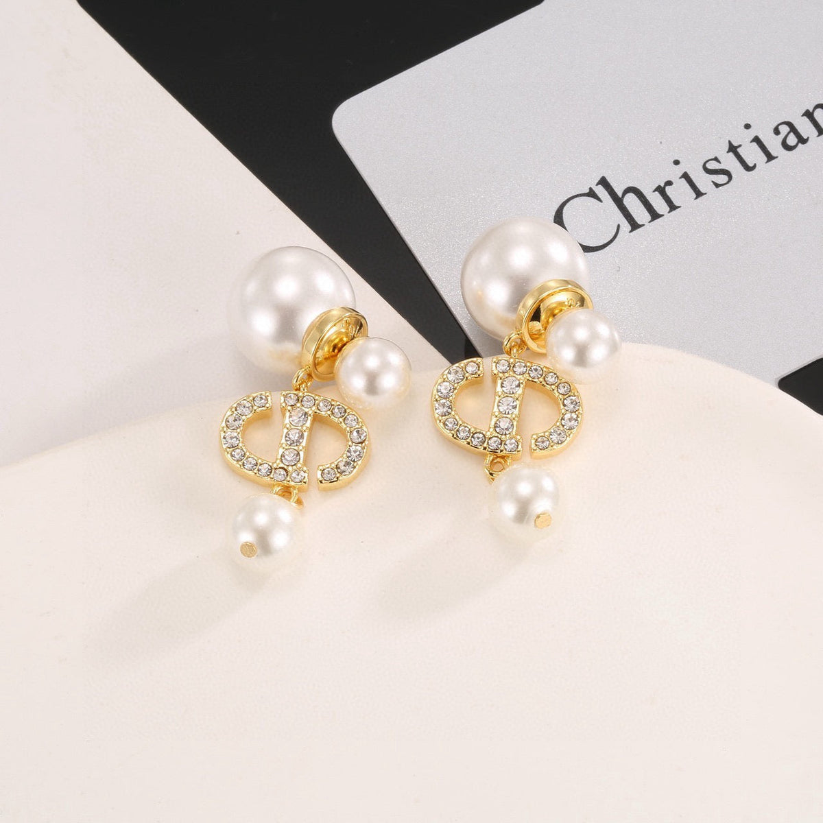 Martin Graham earrings in polished metal-tone – side detail