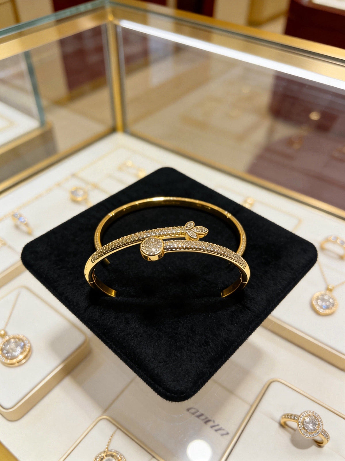 Martin Graham bracelet in polished metal-tone