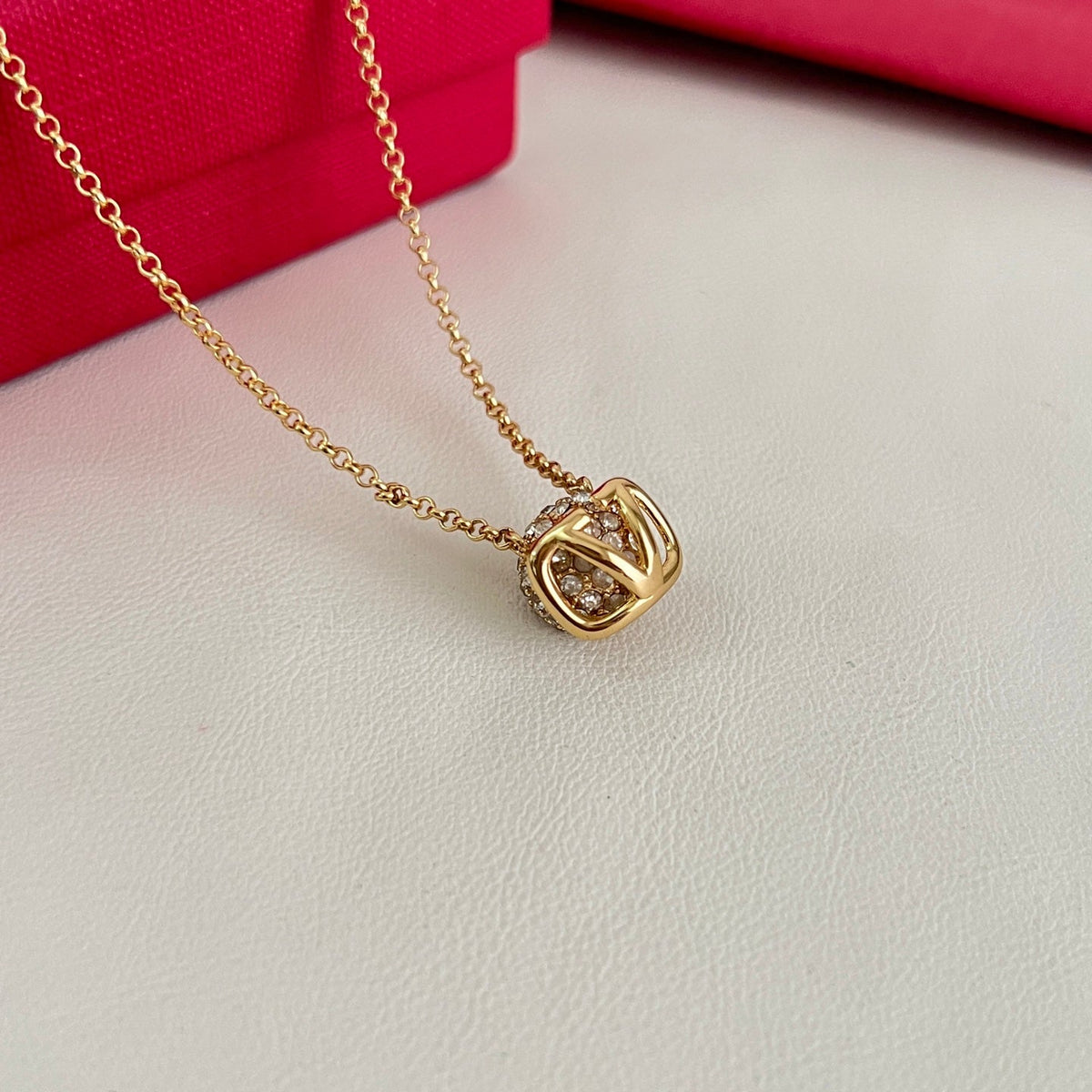 Martin Graham pendant necklace in polished metal-tone