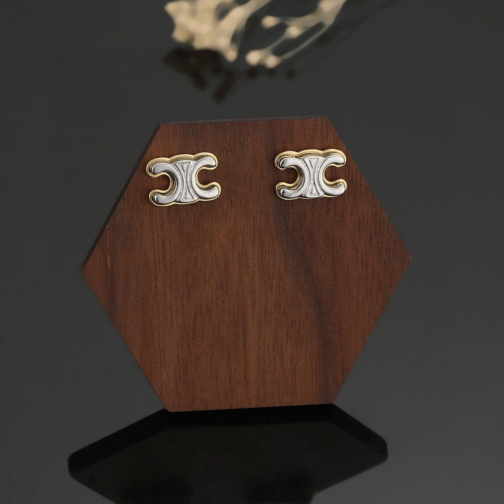 Martin Graham stud earrings in polished metal-tone