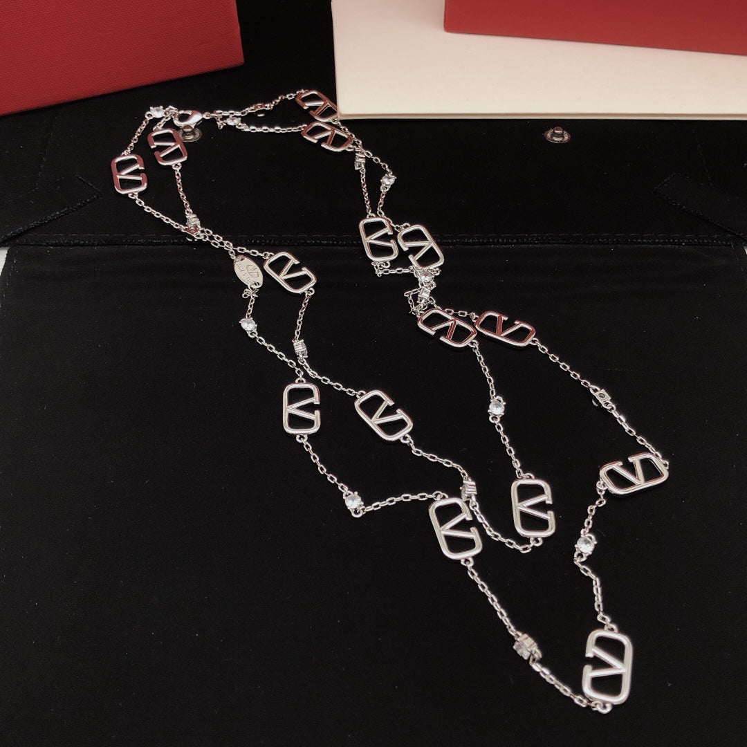 Martin Graham pendant necklace in polished metal-tone