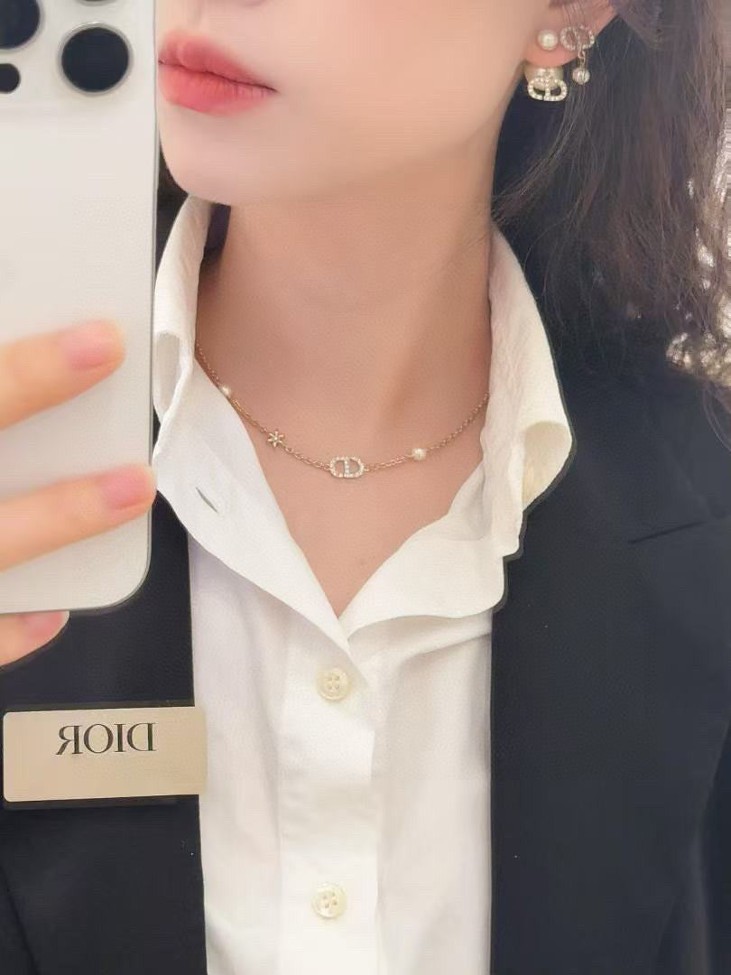Martin Graham pendant necklace in polished metal-tone