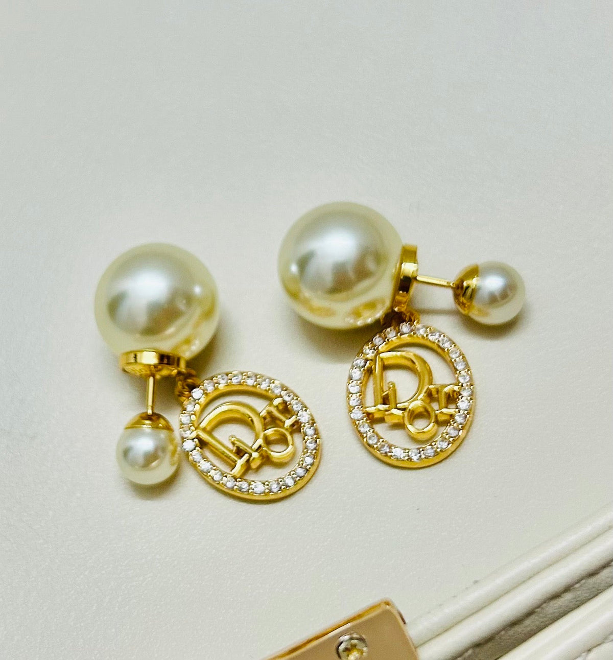 Martin Graham earrings in polished metal-tone