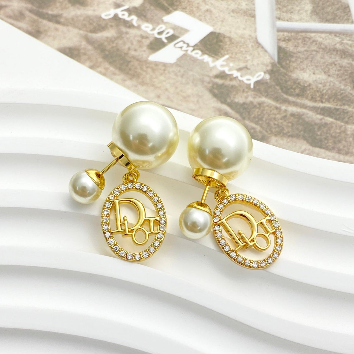 Martin Graham stud earrings in polished metal-tone