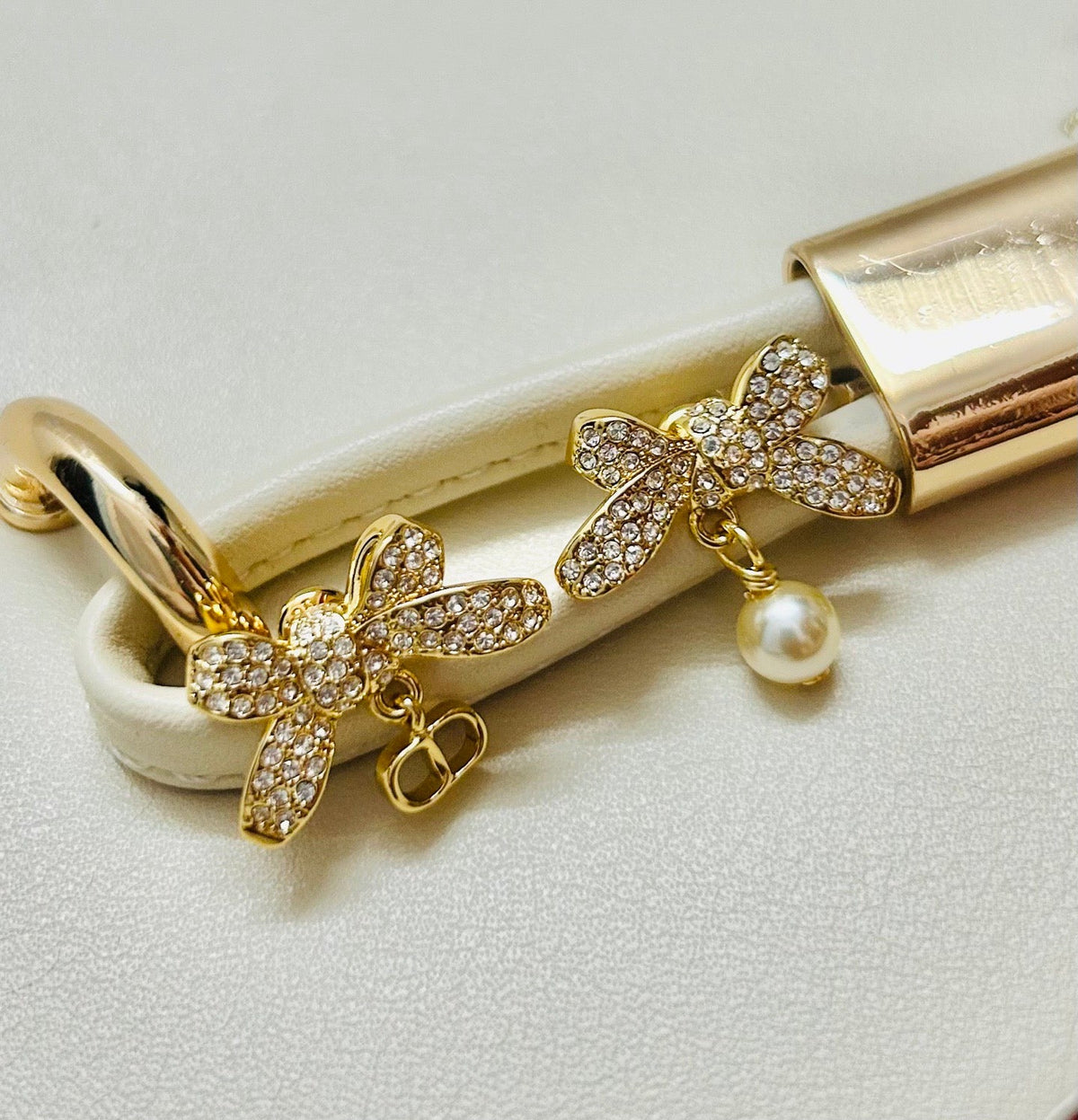 Martin Graham earrings in polished metal-tone
