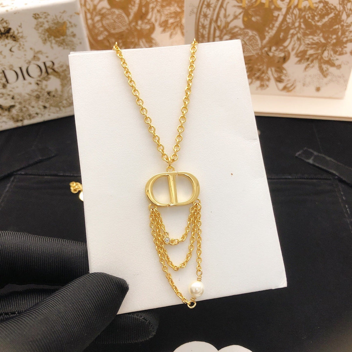 Martin Graham pendant necklace in polished metal-tone