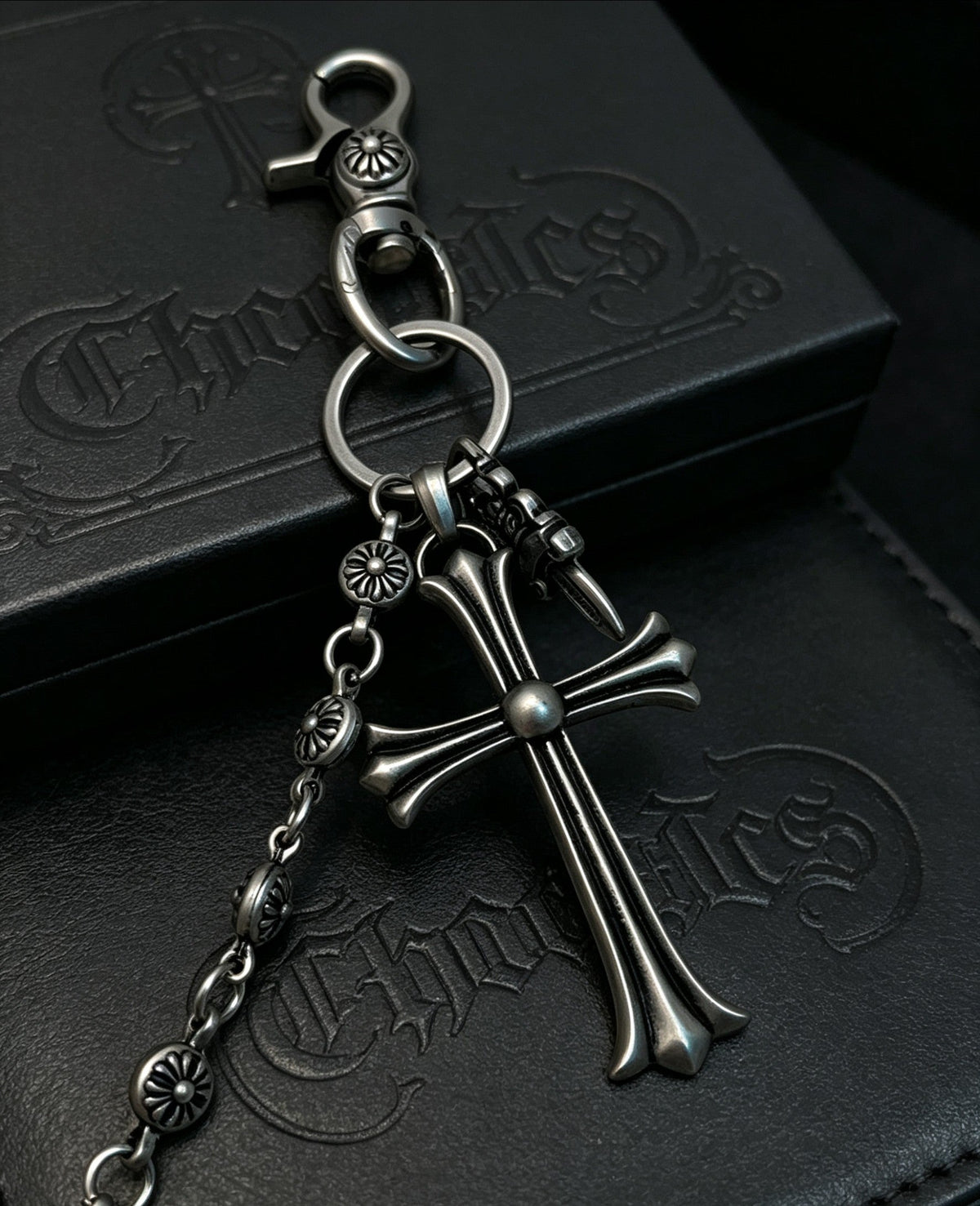 Martin Graham chain accessory in polished metal-tone – close-up detail