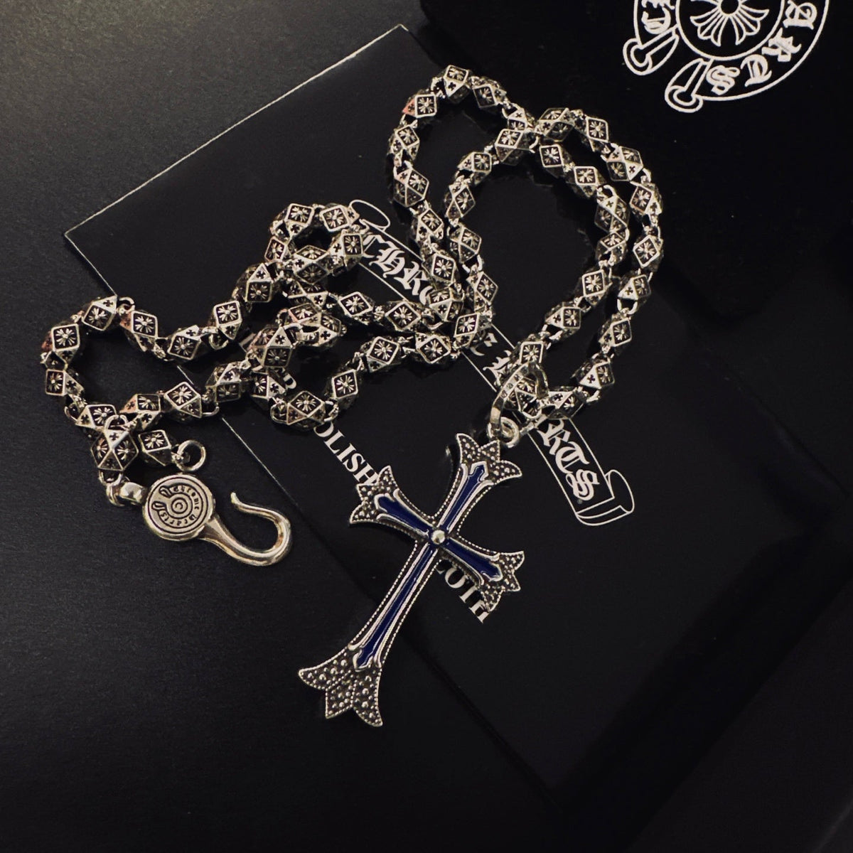 Martin Graham pendant necklace in polished metal-tone – close-up detail