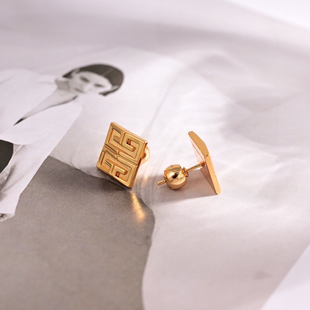 Martin Graham stud earrings in polished metal-tone