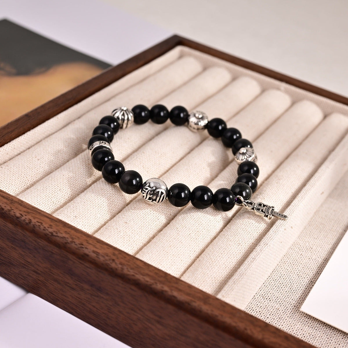 Martin Graham bracelet in polished metal-tone – close-up detail