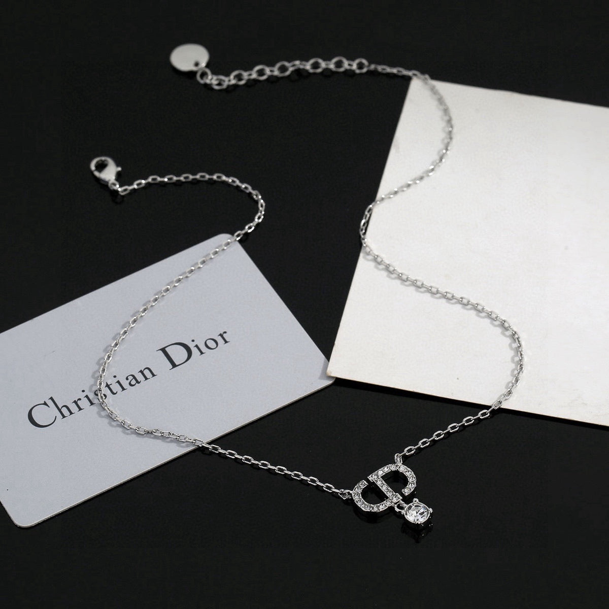 Martin Graham pendant necklace in polished metal-tone