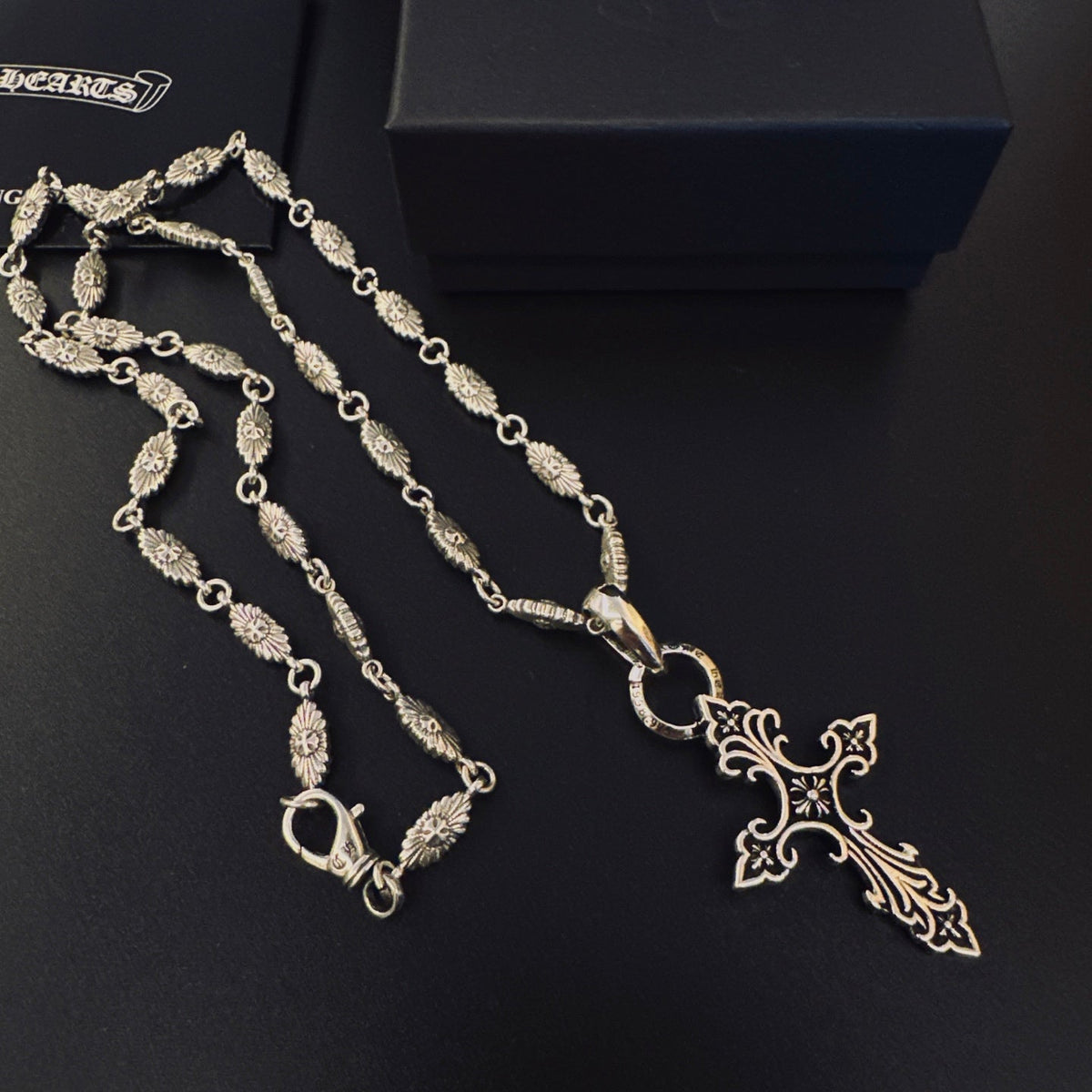 Martin Graham pendant necklace in polished metal-tone – close-up detail