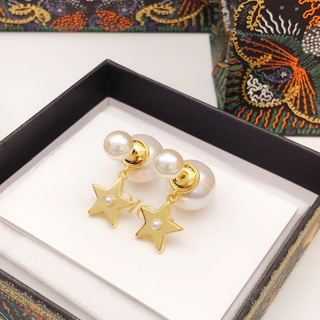 Martin Graham stud earrings in polished metal-tone