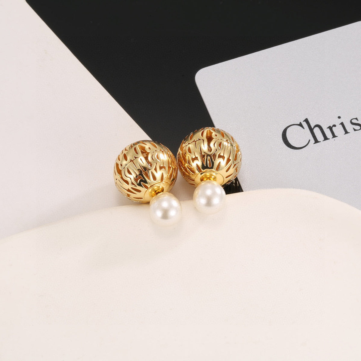Martin Graham earrings in polished metal-tone