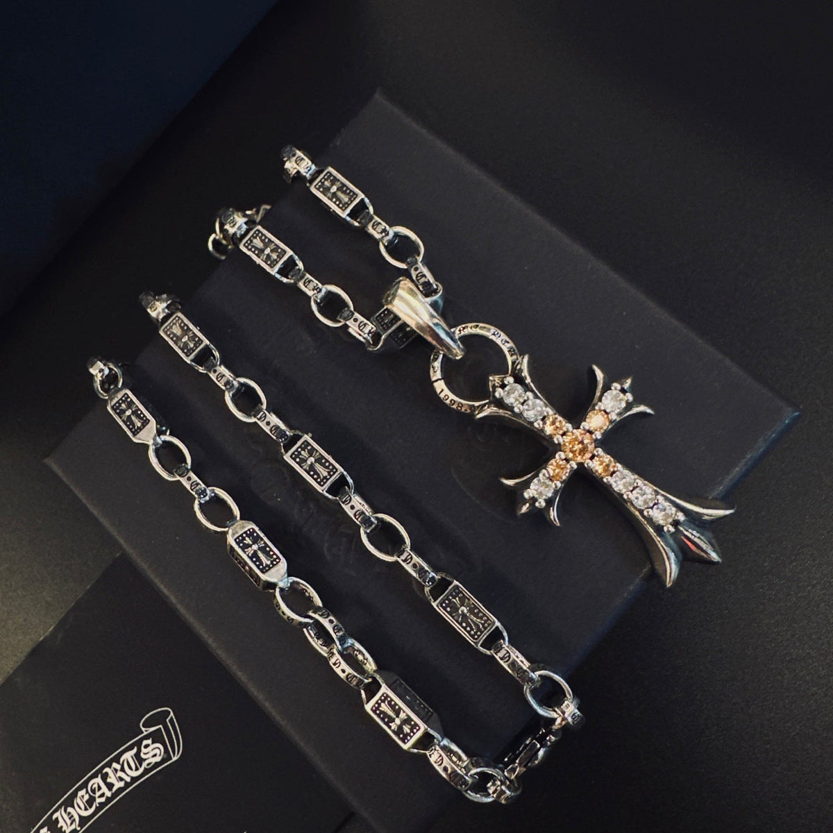 Martin Graham pendant necklace in polished metal-tone – close-up detail