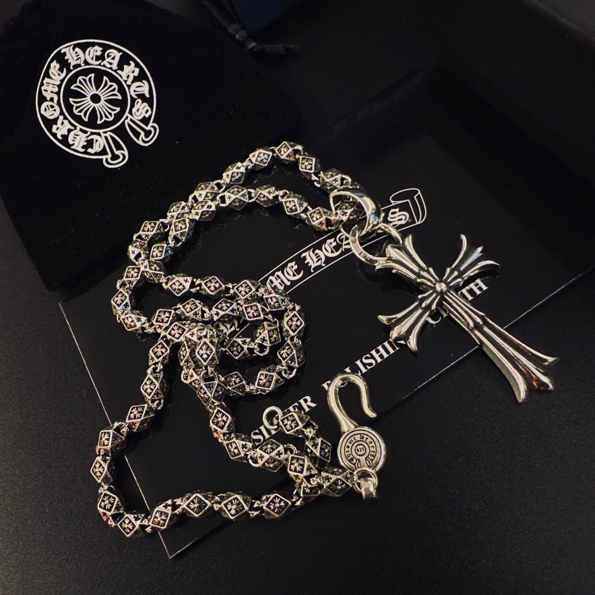 Martin Graham pendant necklace in polished metal-tone – close-up detail