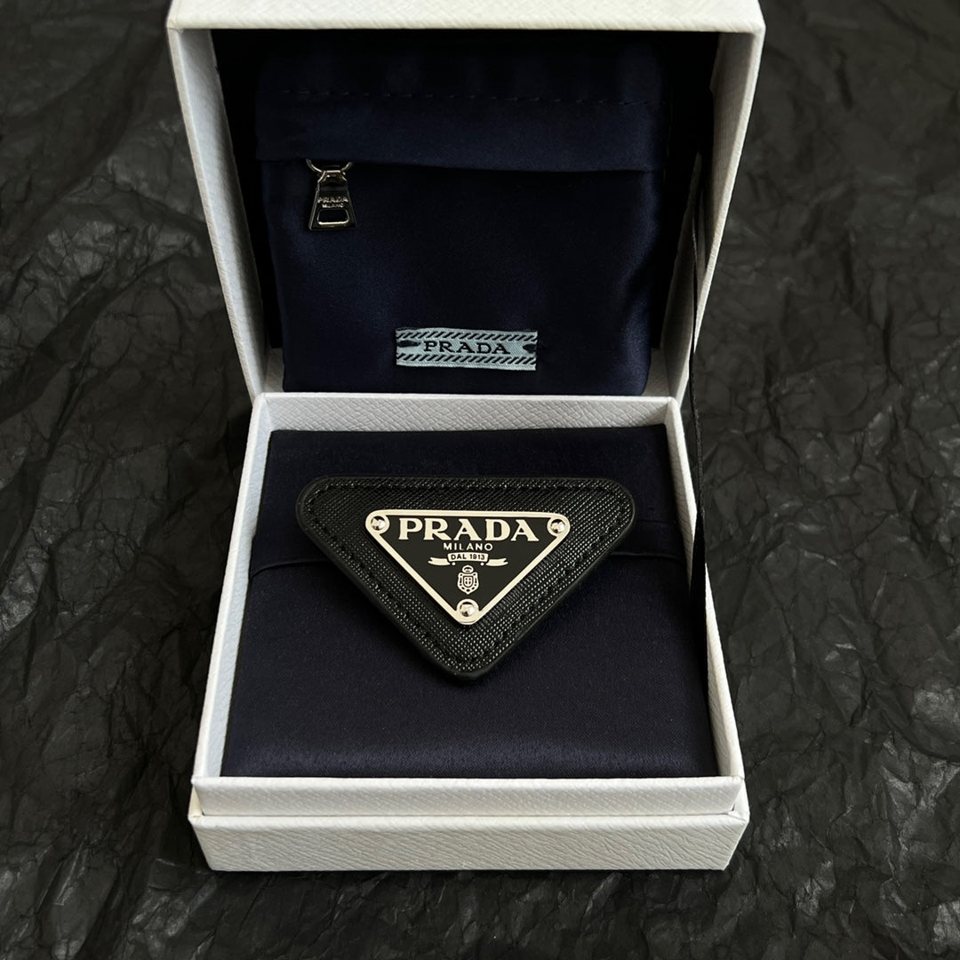 Martin Graham brooch in polished metal-tone