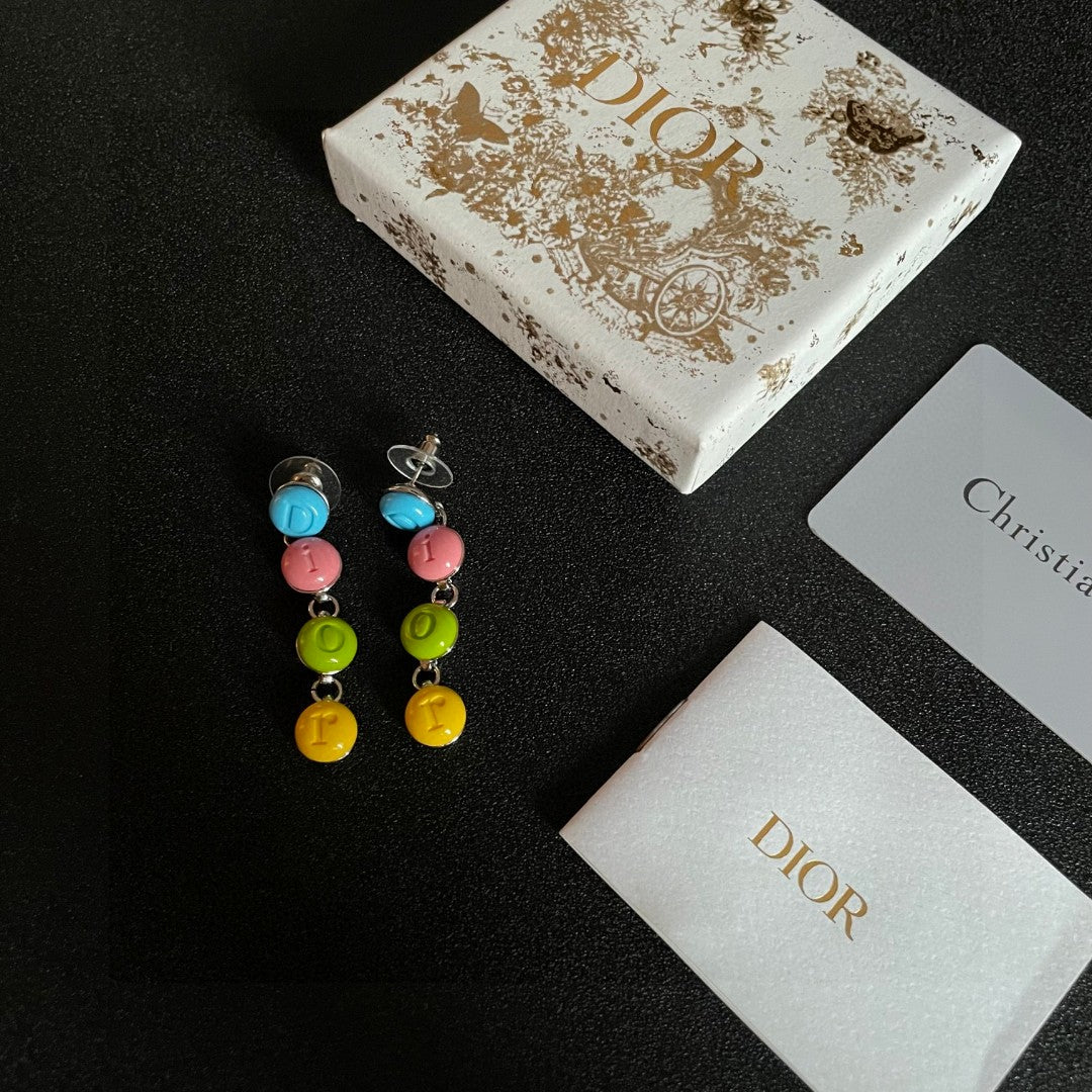 Martin Graham earrings in polished metal-tone