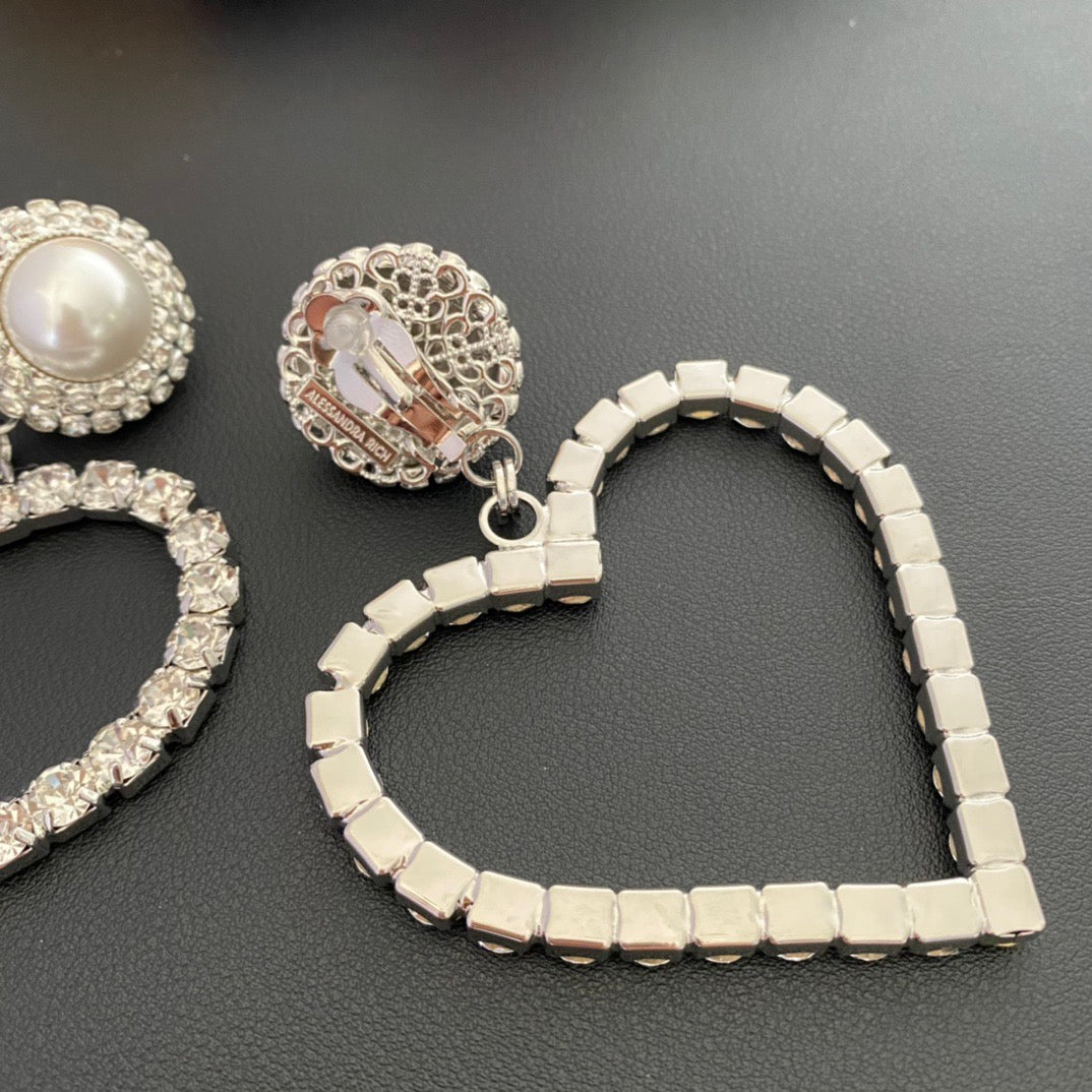 Heart Jewelry Accessory in Polished Metal-Tone – Pearl Detail close-up detail