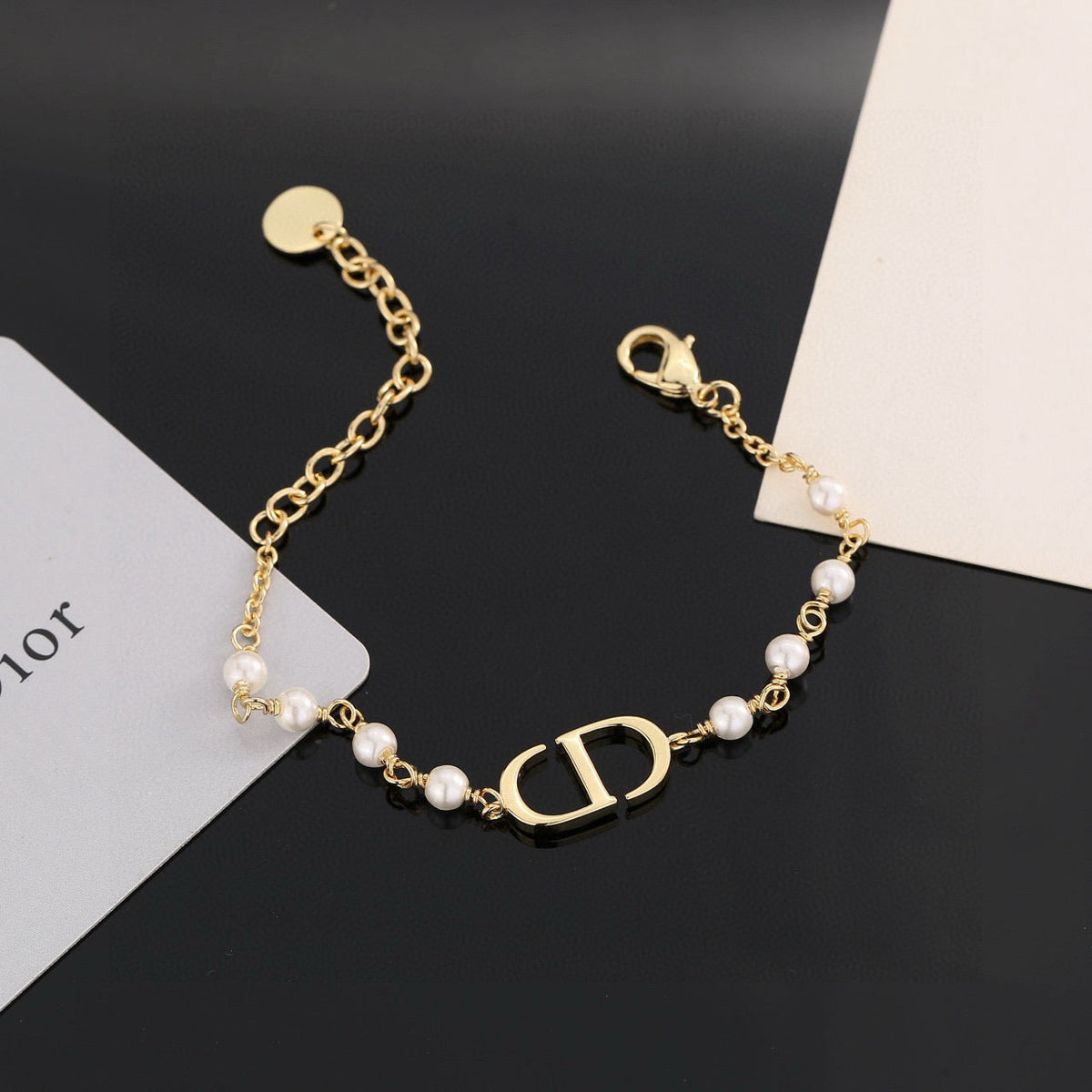 Martin Graham bracelet in polished metal-tone