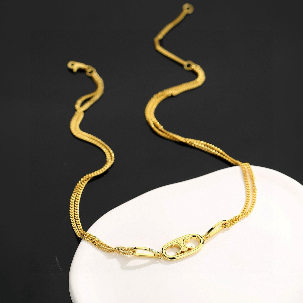 Martin Graham jewelry accessory in polished metal-tone