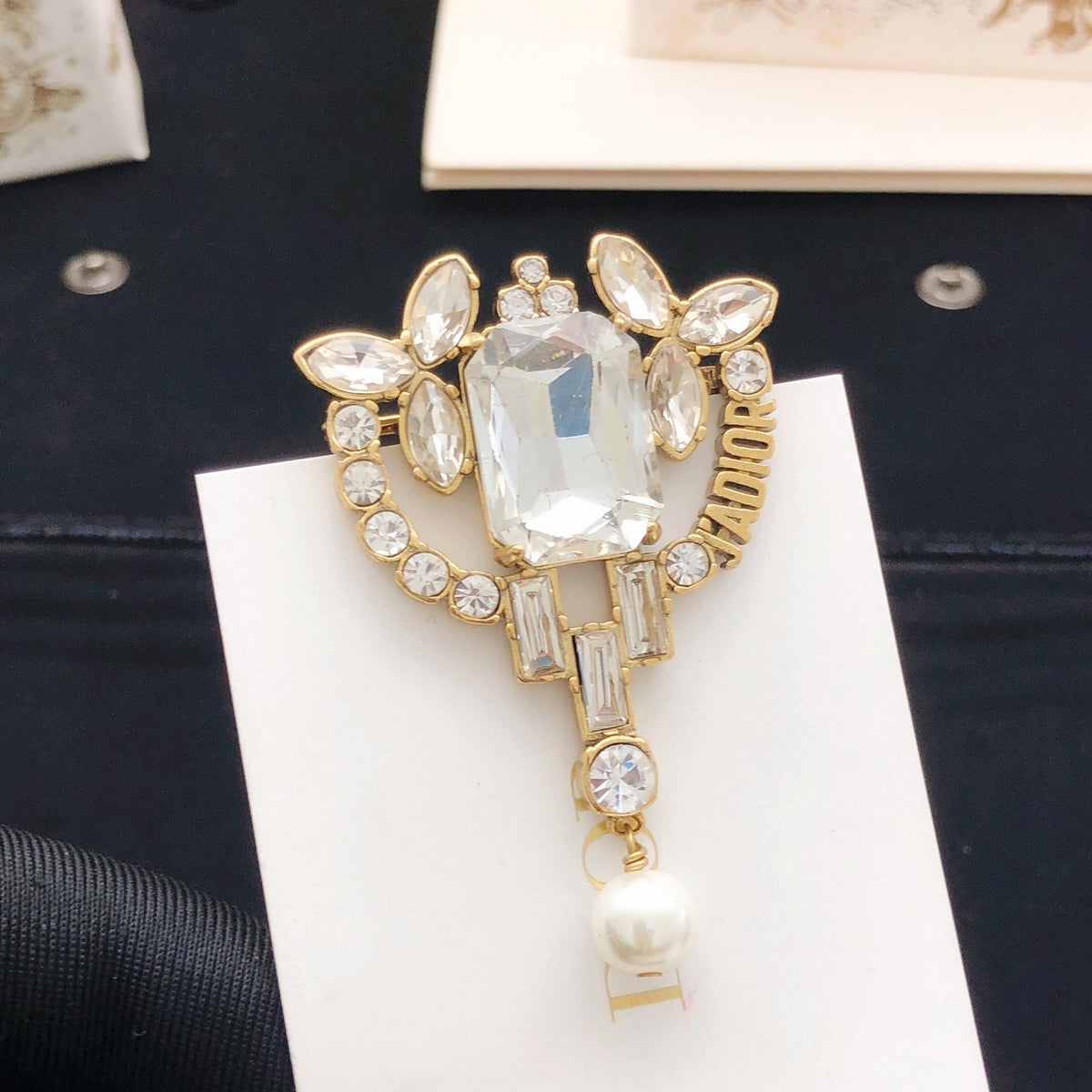 Martin Graham brooch in polished metal-tone