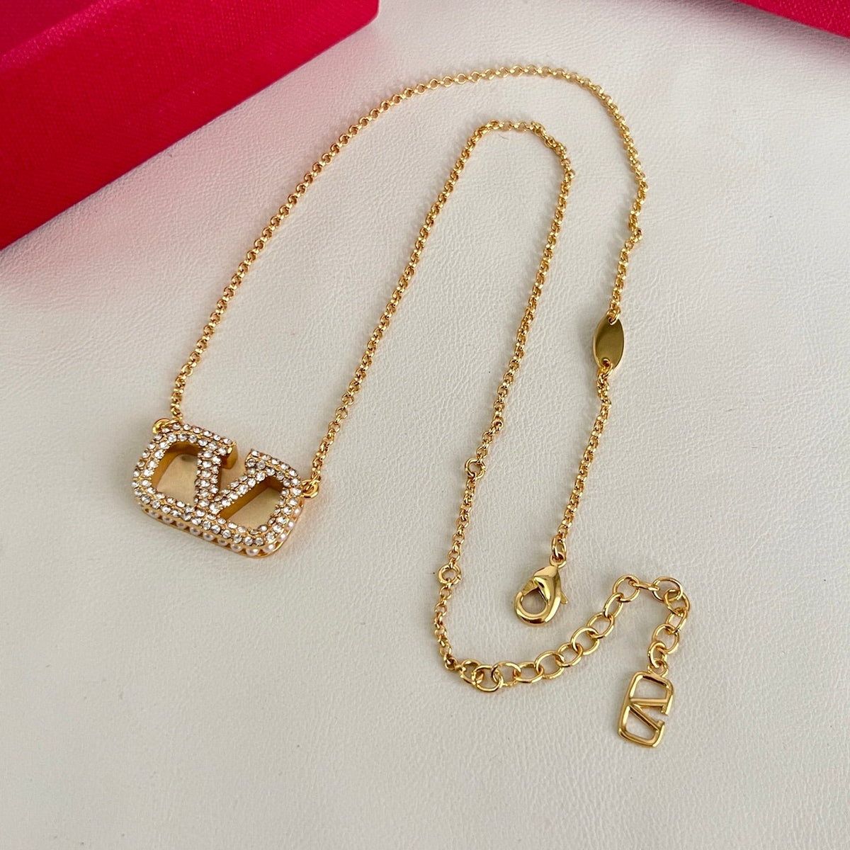 Martin Graham pendant necklace in polished metal-tone