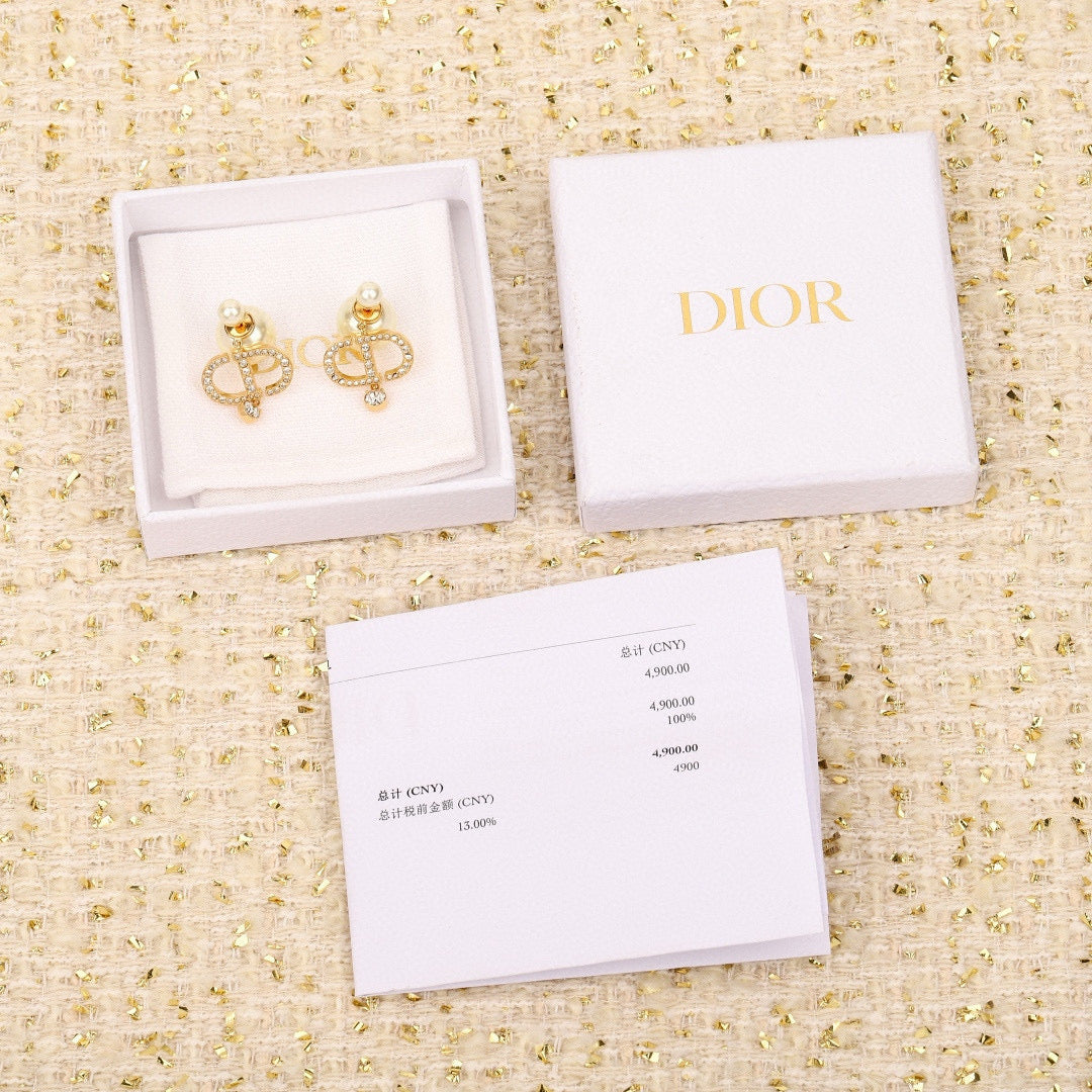 Martin Graham stud earrings in polished metal-tone