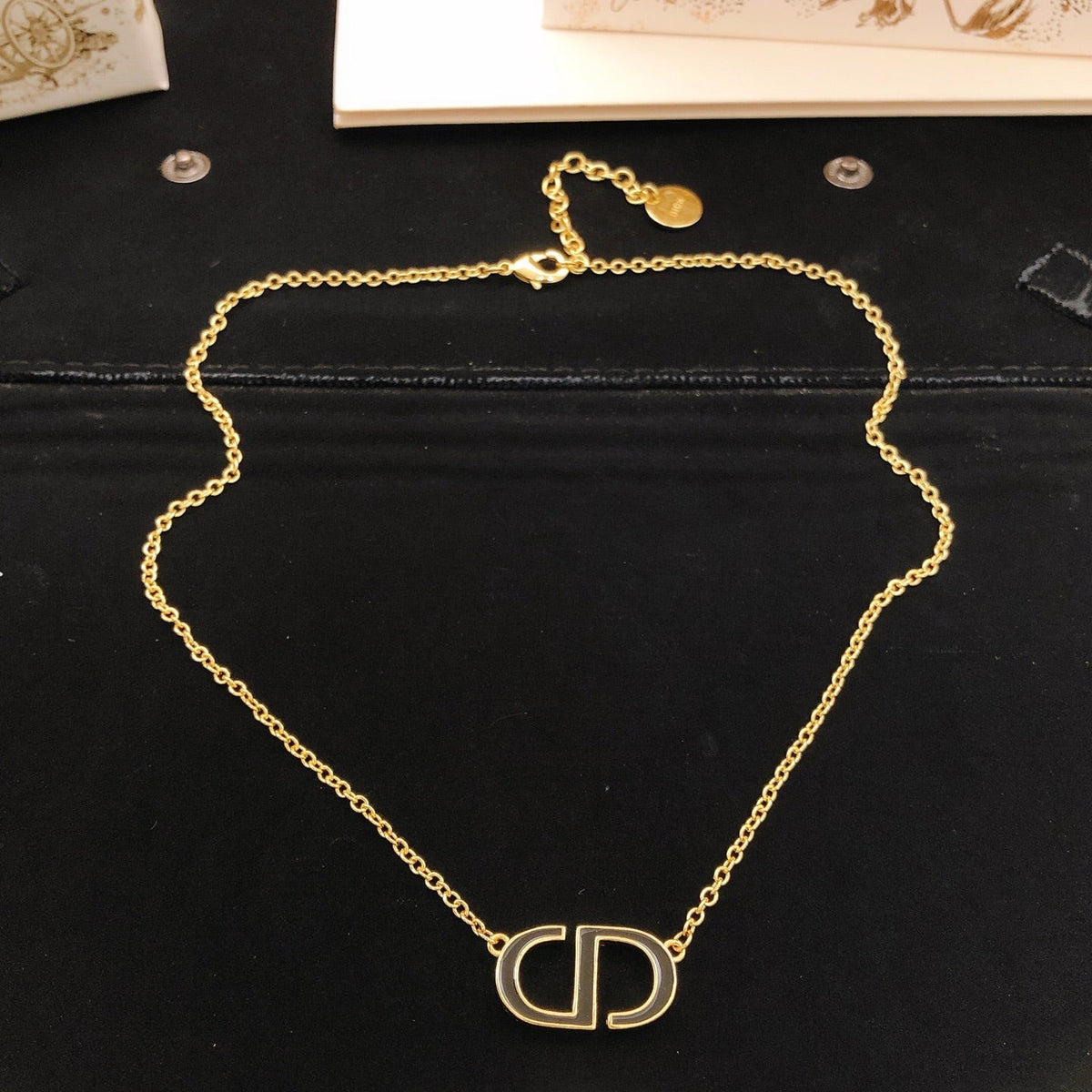 Martin Graham pendant necklace in polished metal-tone
