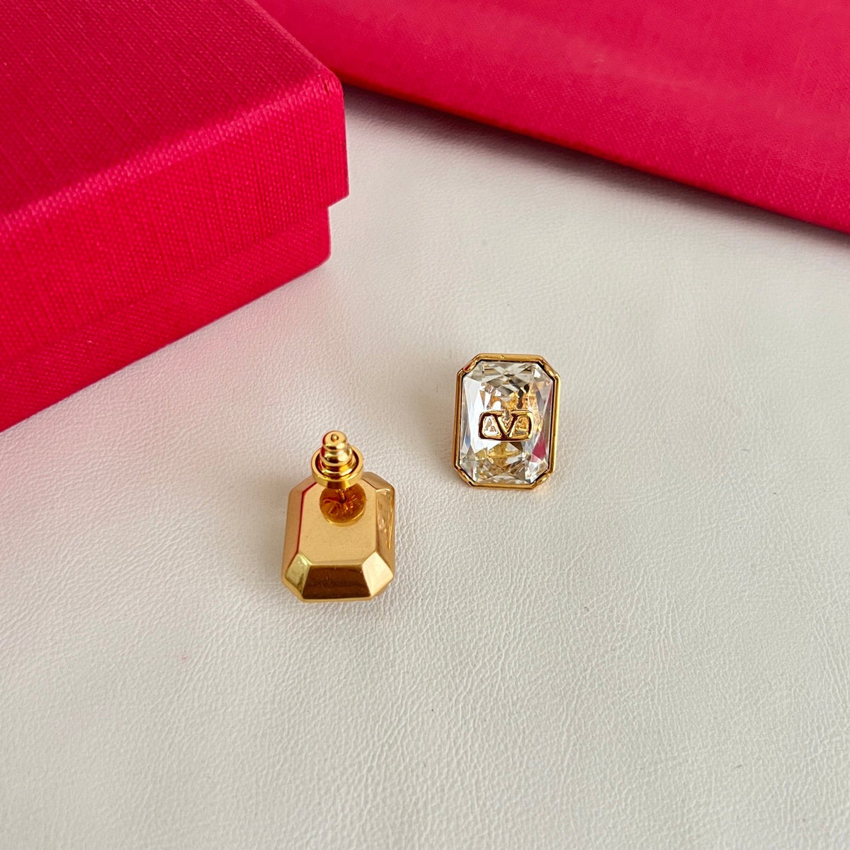 Martin Graham earrings in polished metal-tone