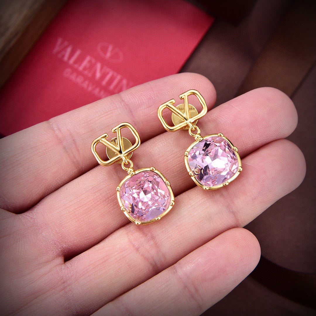 Martin Graham stud earrings in polished metal-tone