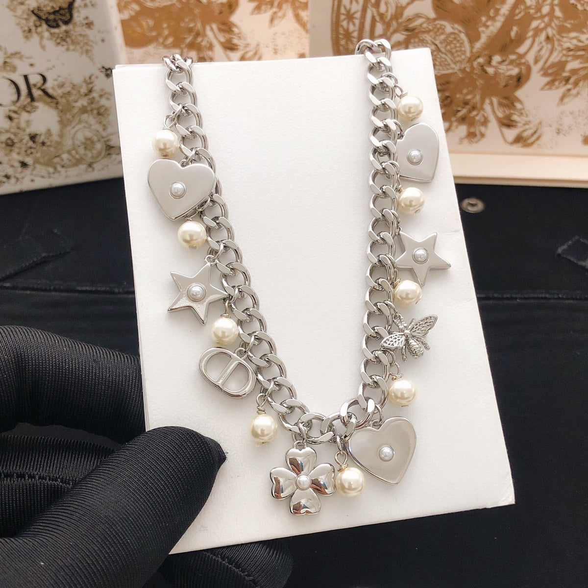 Martin Graham pendant necklace in polished metal-tone