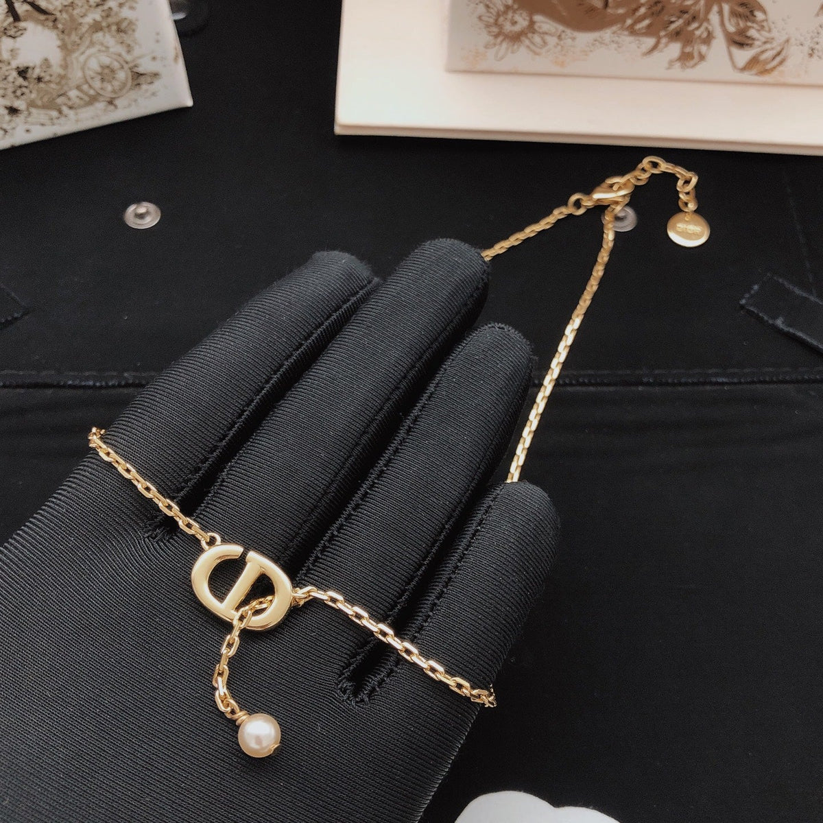 Martin Graham pendant necklace in polished metal-tone