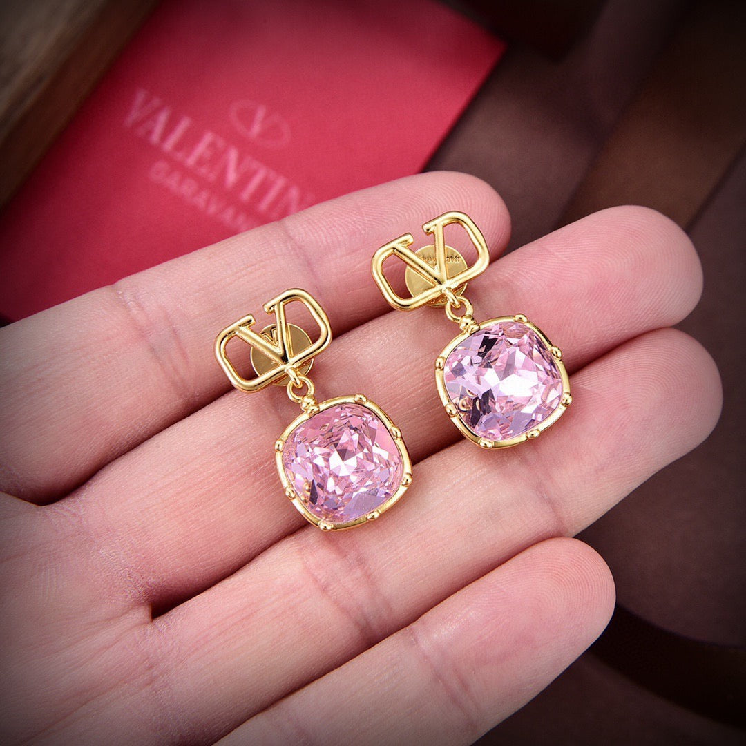 Martin Graham stud earrings in polished metal-tone