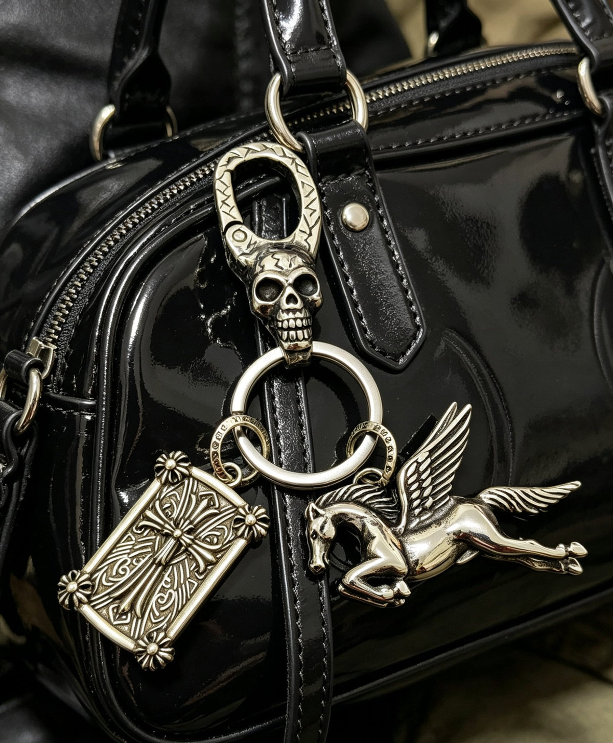 Martin Graham keychain in polished metal-tone – close-up detail