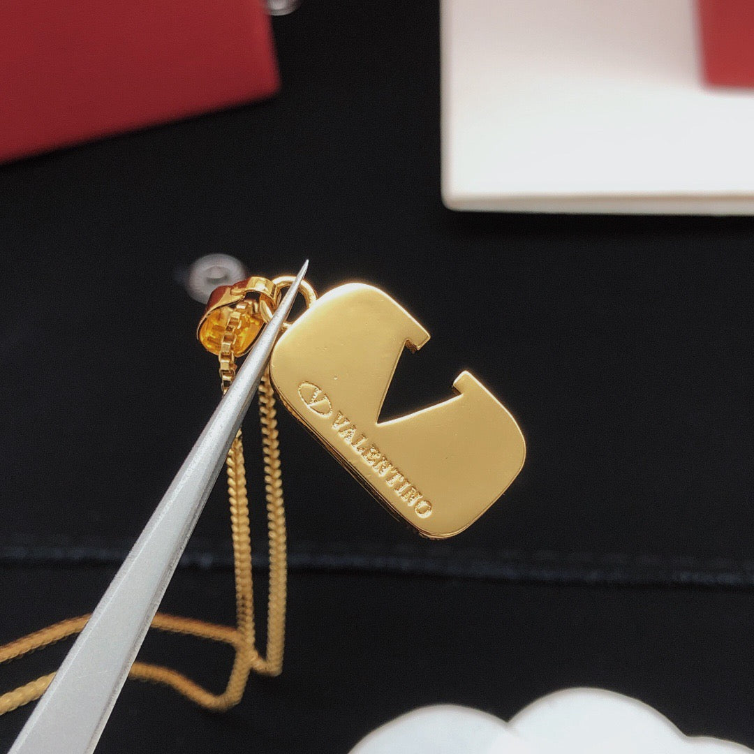 Martin Graham pendant necklace in polished metal-tone