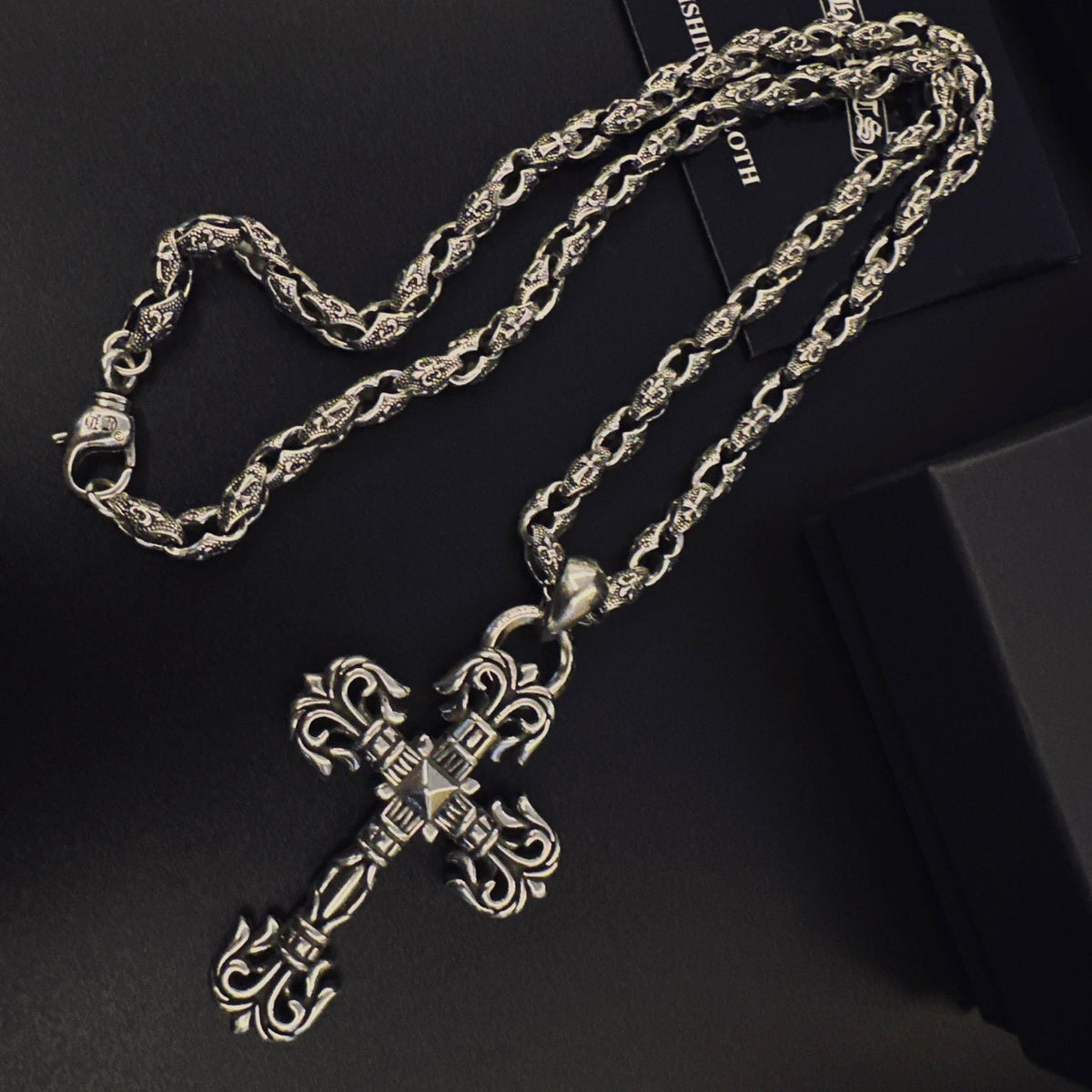 Martin Graham pendant necklace in polished metal-tone – close-up detail