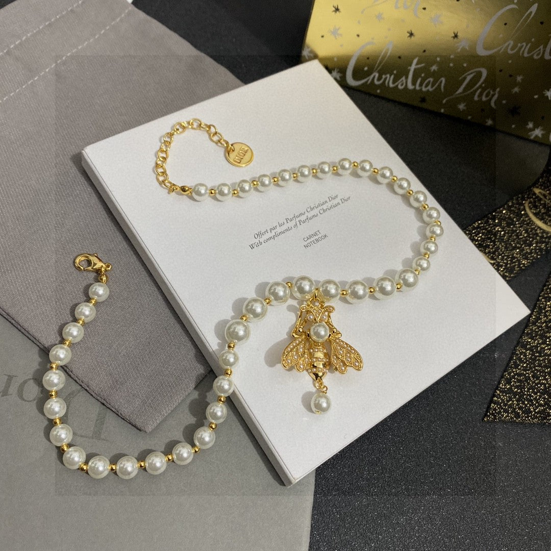 Martin Graham pendant necklace in polished metal-tone