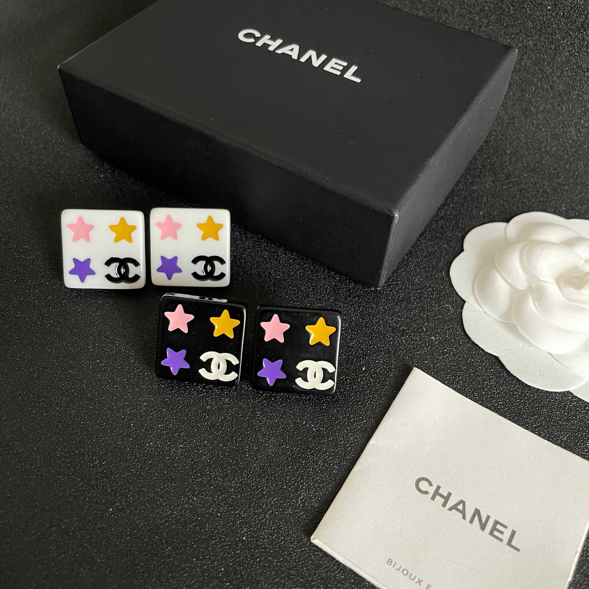 Martin Graham stud earrings in polished metal-tone – close-up detail