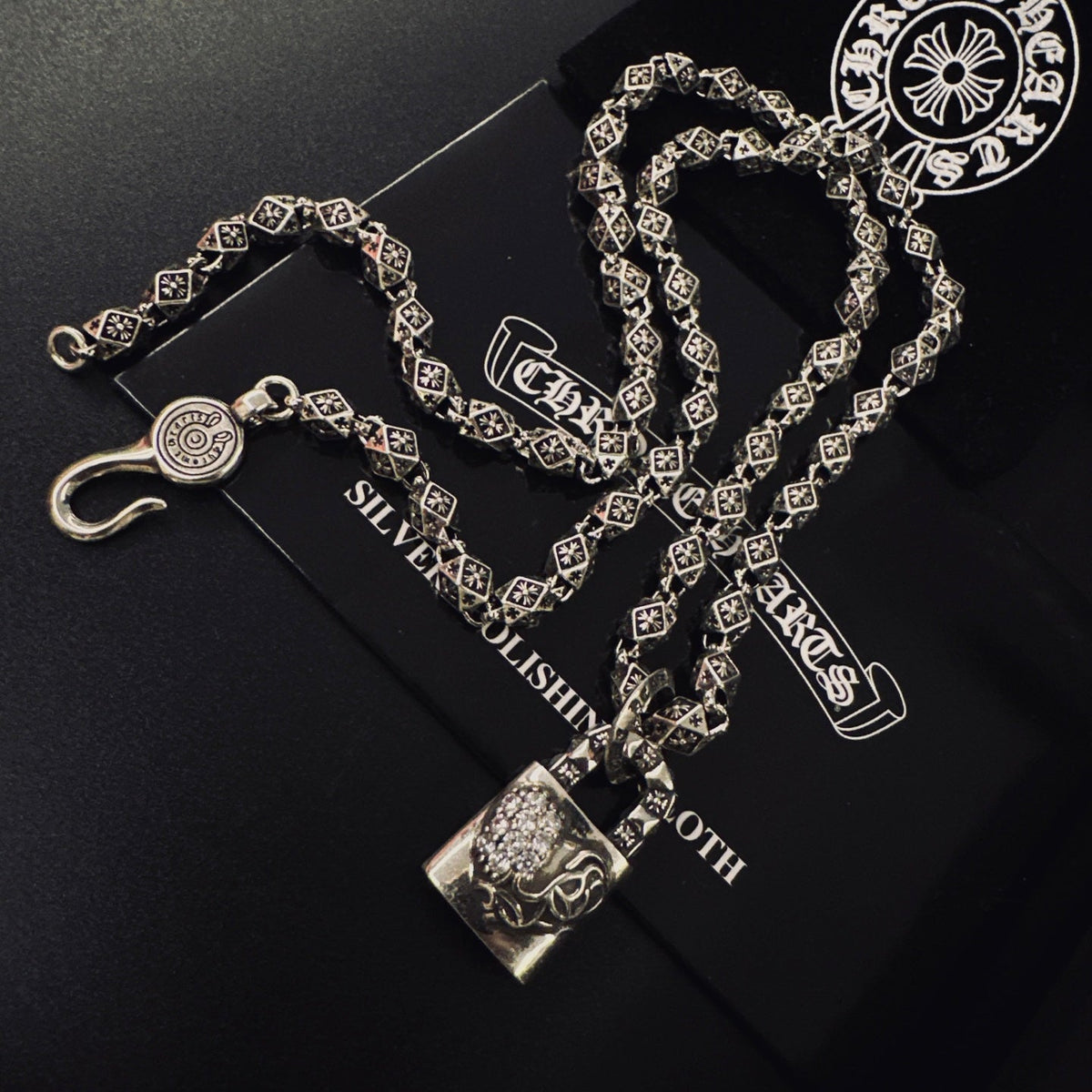 Martin Graham pendant necklace in polished metal-tone – close-up detail
