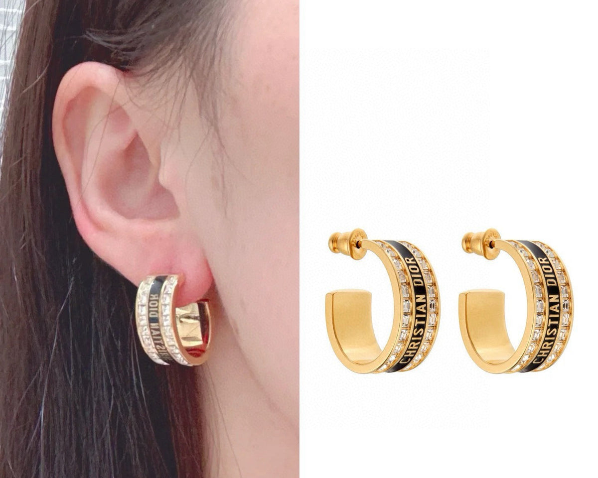 Martin Graham earrings in polished metal-tone
