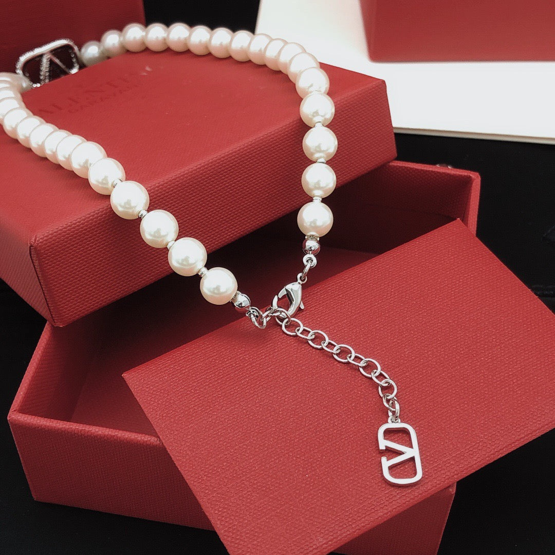 Martin Graham pendant necklace in polished metal-tone