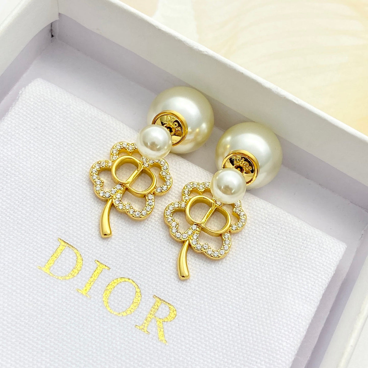 Martin Graham stud earrings in polished metal-tone