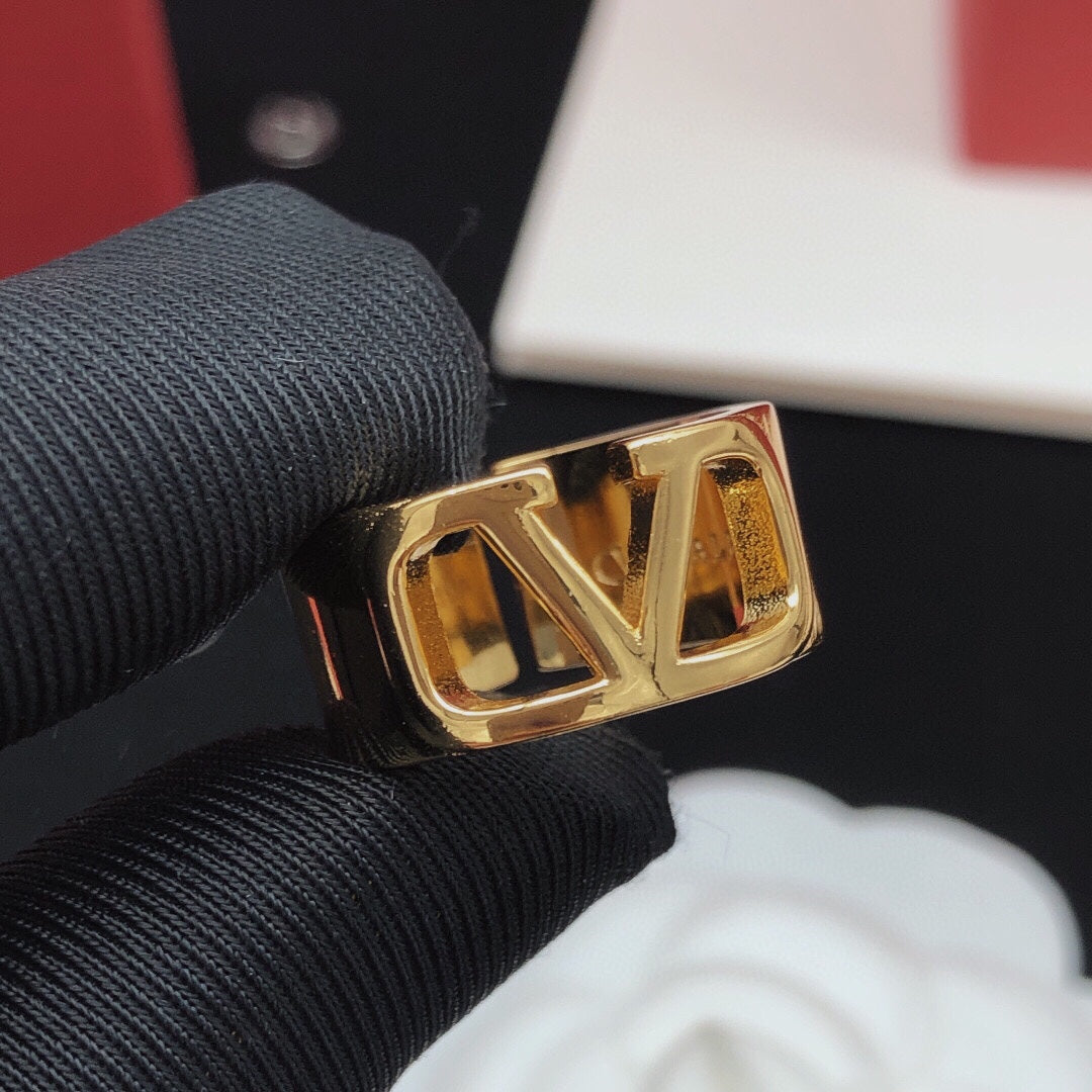 Martin Graham ring in polished metal-tone