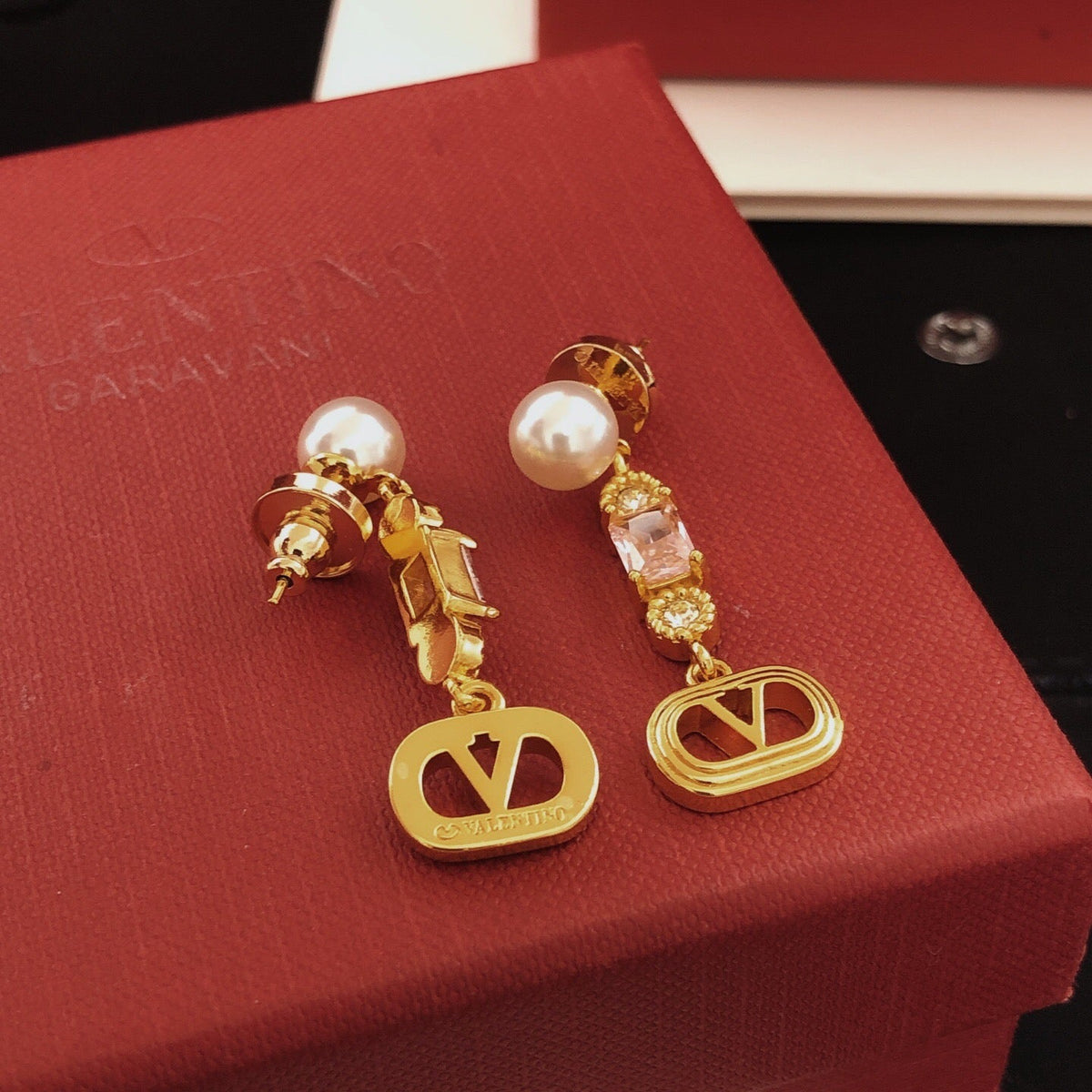 Martin Graham stud earrings in polished metal-tone
