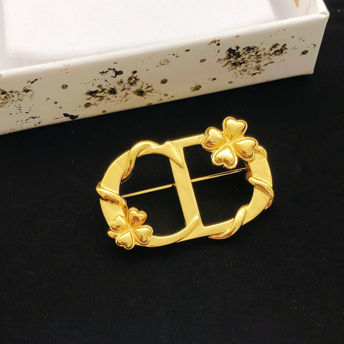 Martin Graham brooch in polished metal-tone