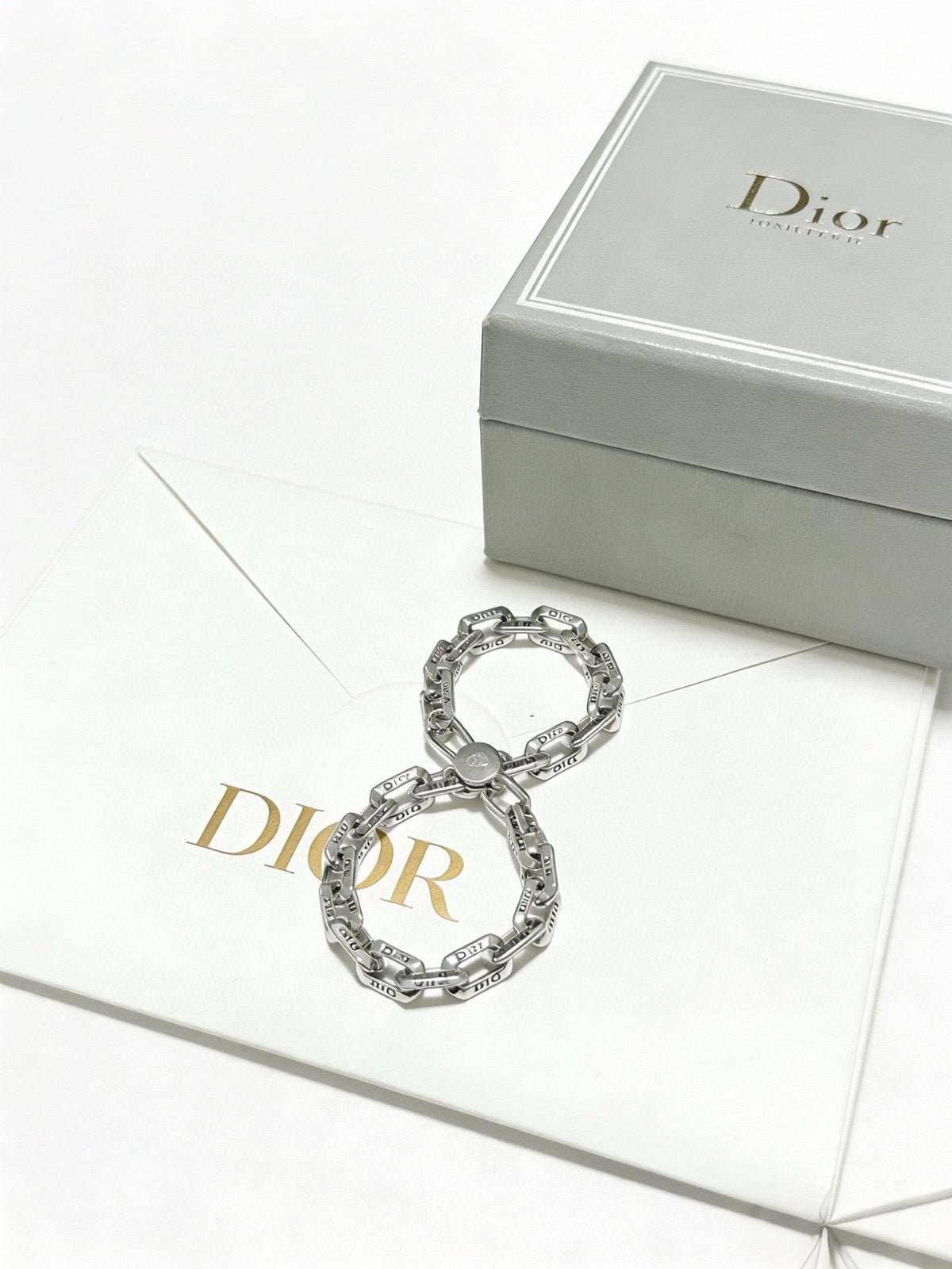 Martin Graham pendant necklace in polished metal-tone